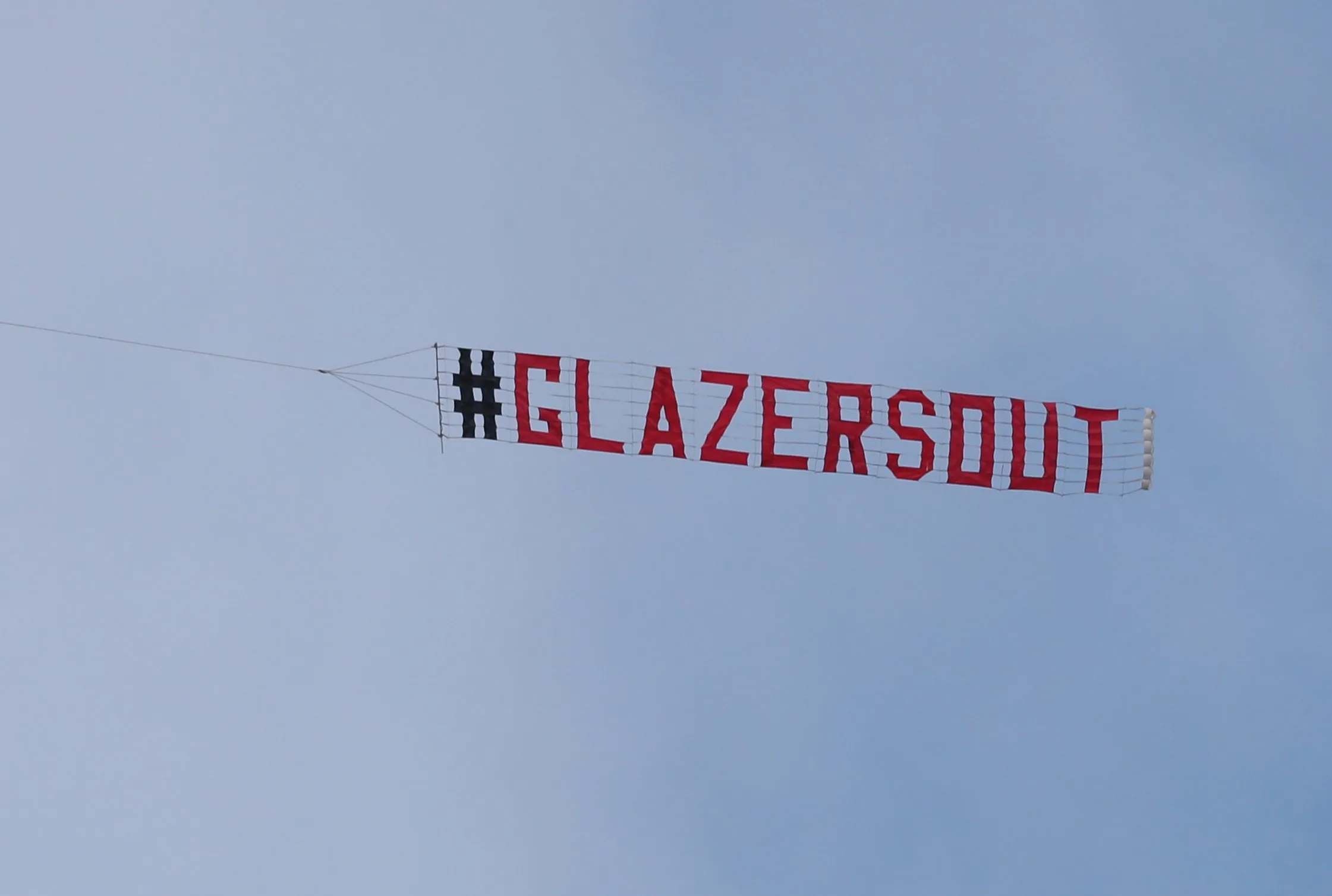 Man Utd Fans Soar High: Glazers Out Banner Flies Above NFL Match